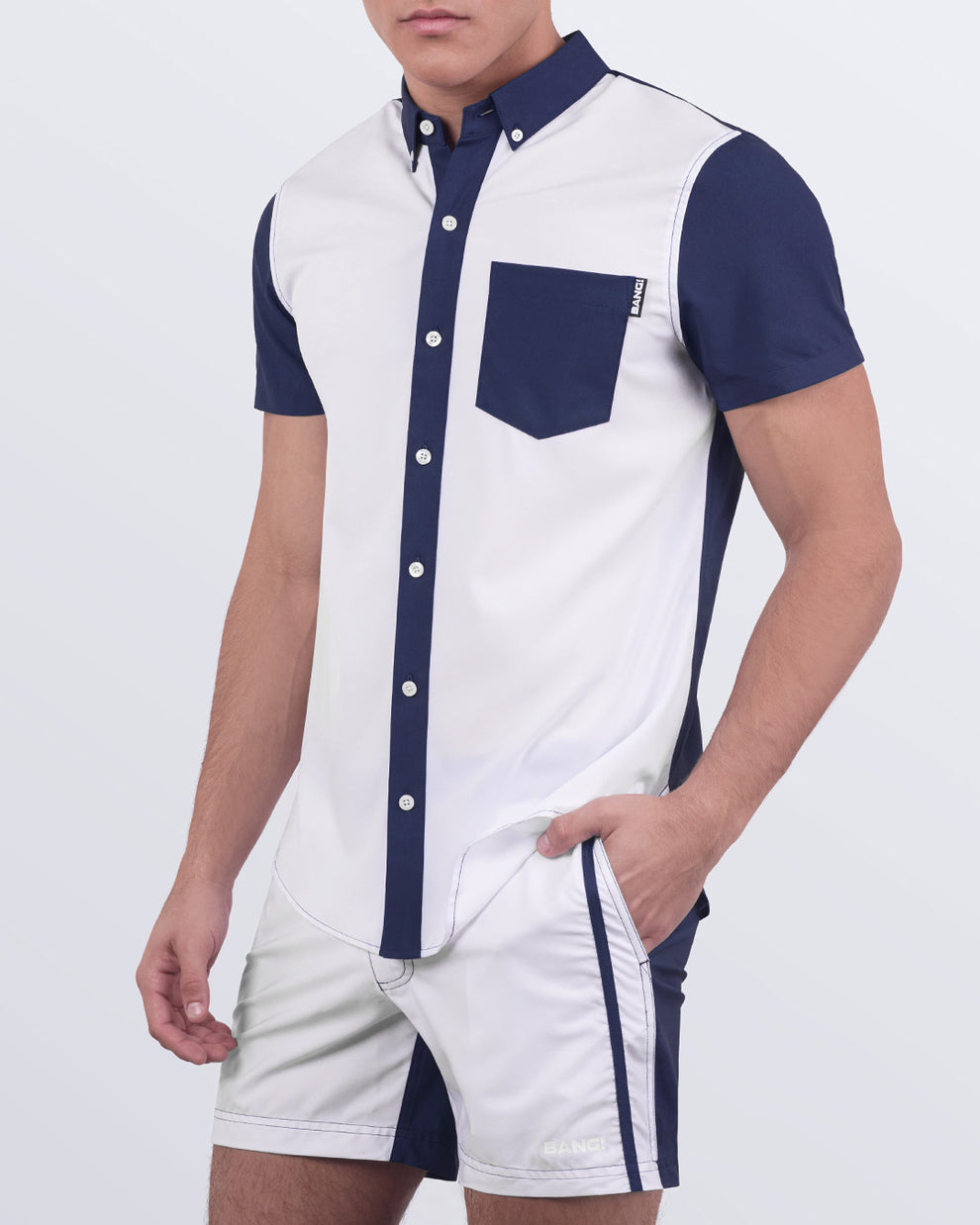 Men's resort outfit in CASINO ROYALE (WHITE + NAVY BLUE) – BANG! Miami stretch shirt paired with matching swim shorts. Perfect set for tropical getaways, beach clubs, or summer events.