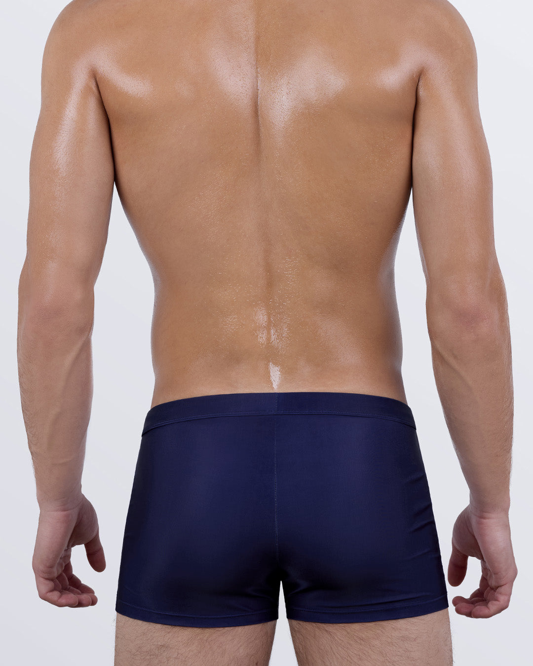 Back view of the CASINO ROYALE Swim Trunks – solid navy blue rear for a bold, streamlined finish.