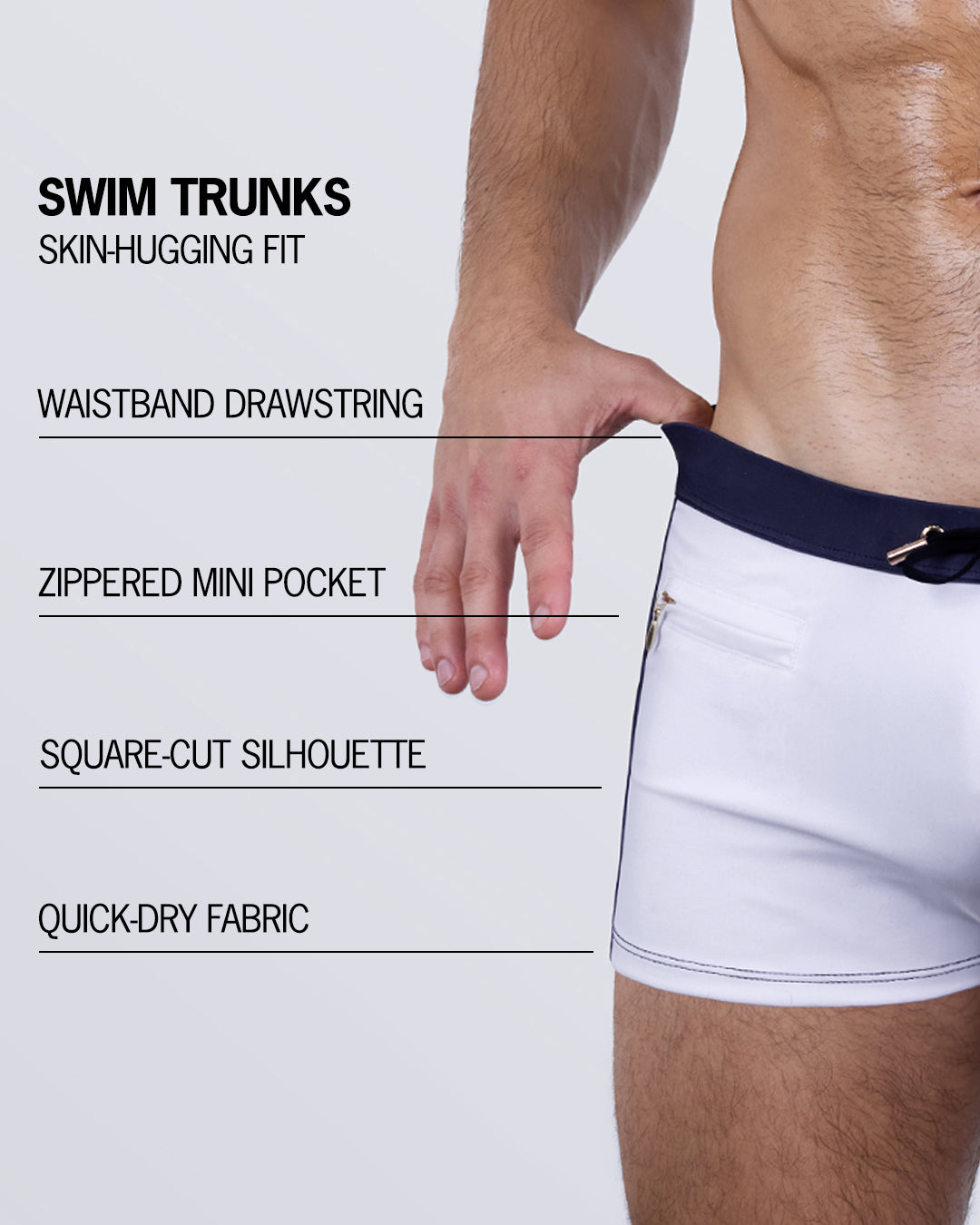 Breakdown of the CASINO ROYALE (WHITE + NAVY BLUE) Swim Trunks – tailored fit with square-cut legs, drawstring waistband, zippered mini pocket, and quick-dry stretch fabric.