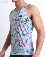 Side view of the CLOSE TO YOU beach quick-dry tank top for men, inspired by exotic birds on top of branches and pink flowers, this top is designed by DC2 in Miami.