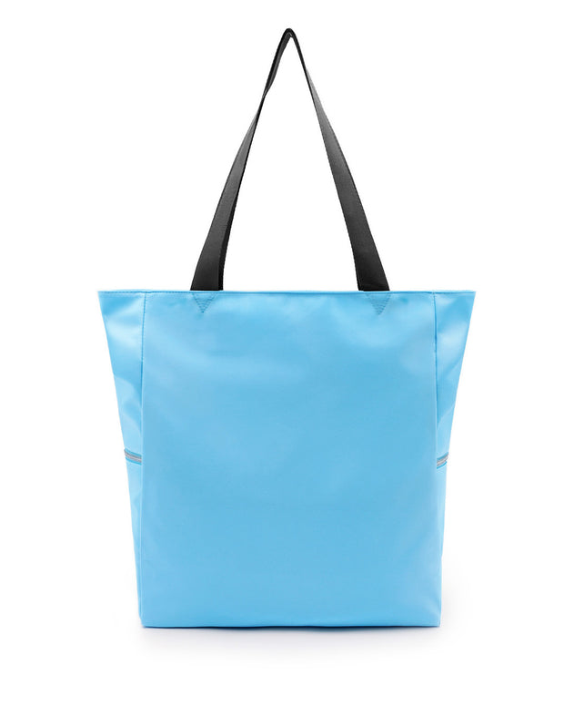 The COASTAL BLUE Poolside Tote Bag by DC2 Miami, features a solid sky blue color. This bag is a perfect companion for beach outings, shopping trips, or everyday use.