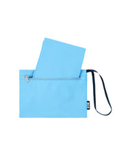 Close-up view of the detachable pouch from the COASTAL BLUE Poolside Tote Bag by DC2 Miami. The pouch features a stylish solid blue color, a secure zippered closure, and a convenient wrist strap for easy carrying. Designed for versatility, this pouch is perfect for storing small essentials.