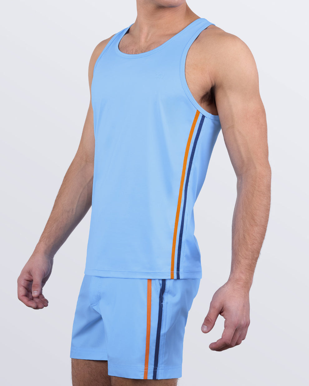Side view of the COASTAL BLUE beach quick-dry tank top for men features a in a solid blue color, made by DC2 a capsule brand by BANG! Clothes in Miami.