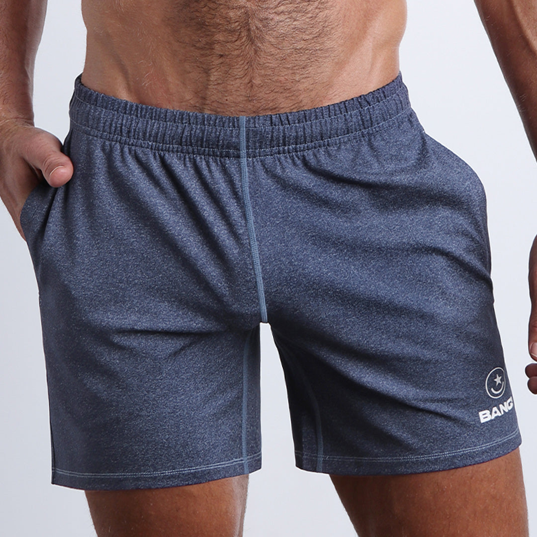 COMPOUND BLUE jogger shorts in a heathered dark blue quick-dry by the Bang! brand of men's beachwear from Miami.