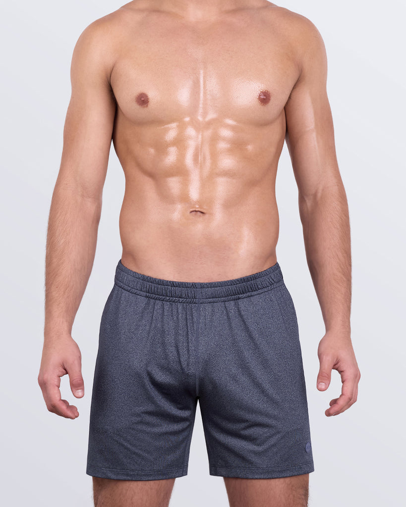 DC2 COMPOUND BLUE Jogger Shorts — front view on model, featuring rich blue performance fabric and athletic cut.
