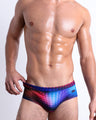 Front view of the CONFESSIONS ON A SAND FLR VOL 2 men’s bikini-style bottoms in multiple colors disco ball print by the Bang! brand of men's beachwear from Miami.