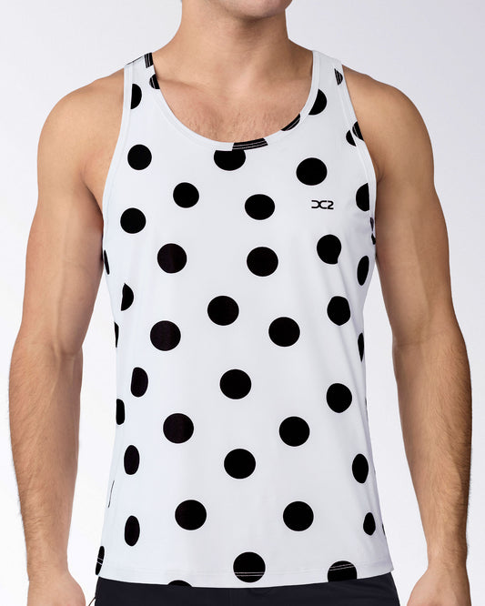 Connect The Dots Tank Top by DC2 Miami featuring oversized black polka dots on white performance fabric with a lightweight athletic fit.