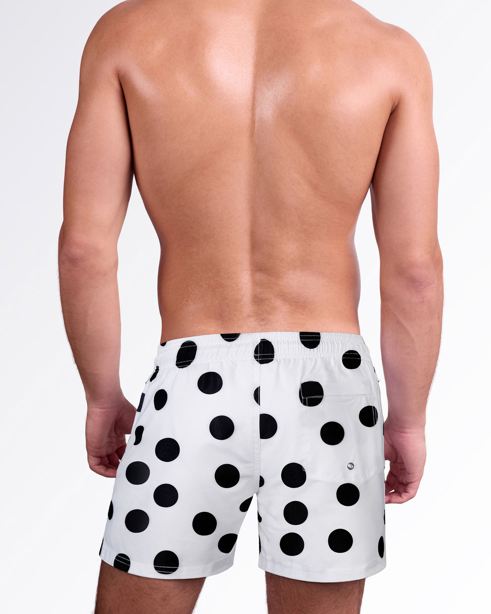 Back view of the Connect the Dots Resort Shorts showcasing the playful black polka dot print, comfortable elastic waistband, and rear pocket detail.