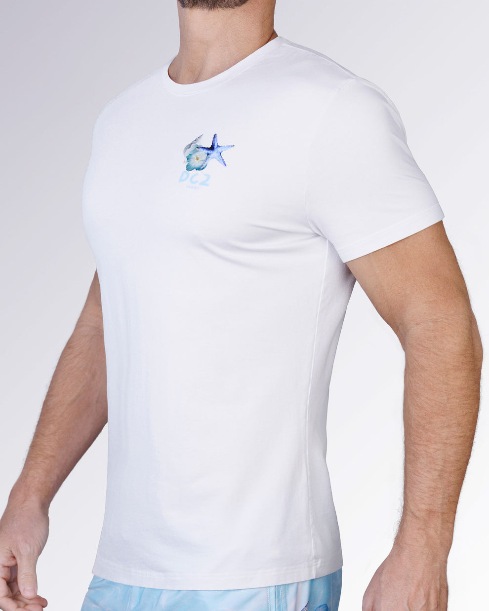 ngled side view of the Coral Way Cotton Graphic T-Shirt by DC2 Miami, highlighting the slim cut and coastal chest artwork.