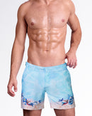 Coral Way Tailored Shorts by DC2 Miami with a light blue ocean print, shell details, and polished men’s swimwear silhouette.
