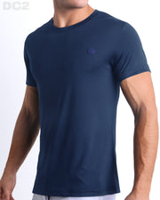 Side view of men’s performance exercise top in a blue color made by DC2 the official brand of mens sportswear.