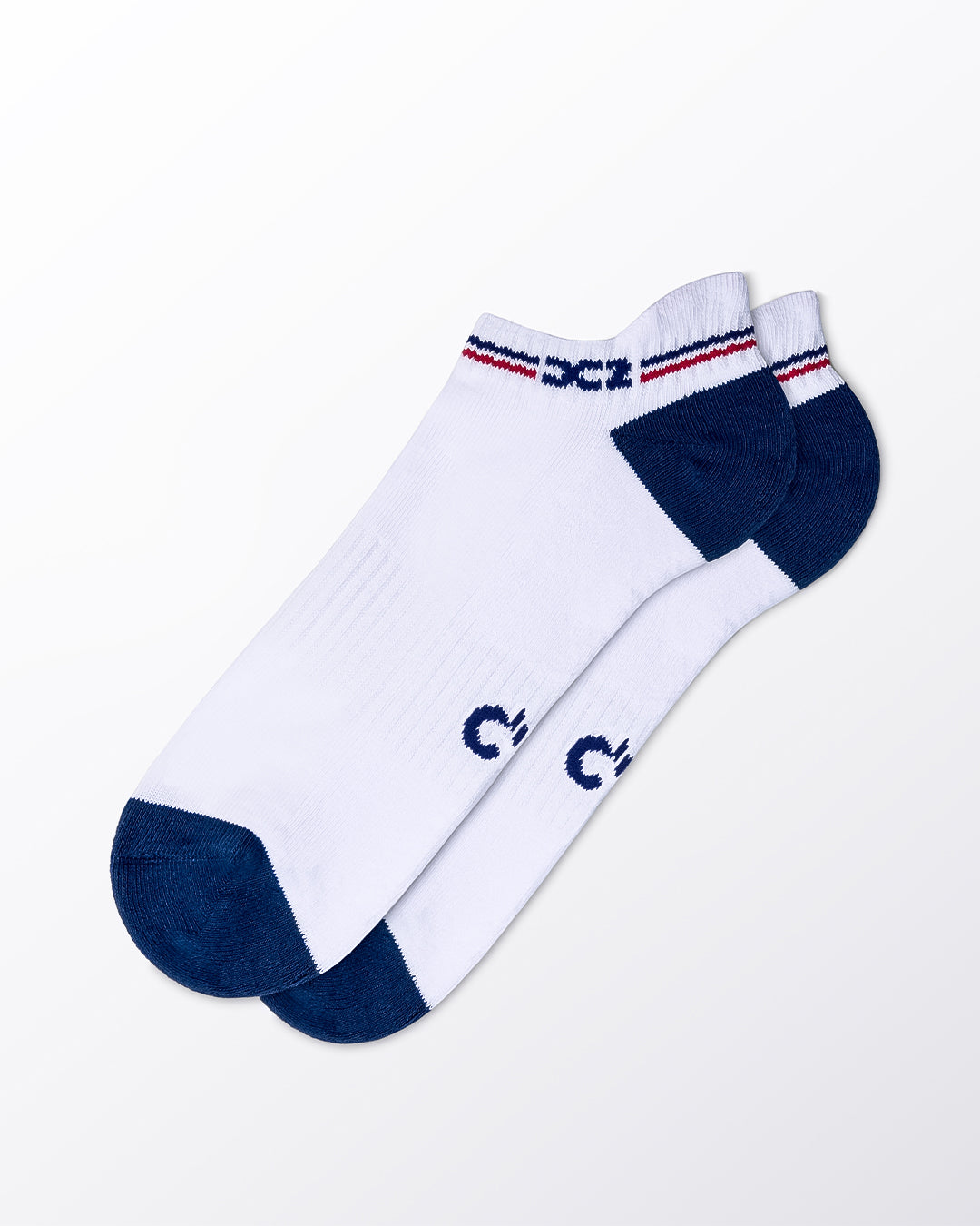 DC2 Daily Ribbed Ankle Socks (White) — pair of low-cut socks with navy toe and heel, red and navy striped cuff detail.