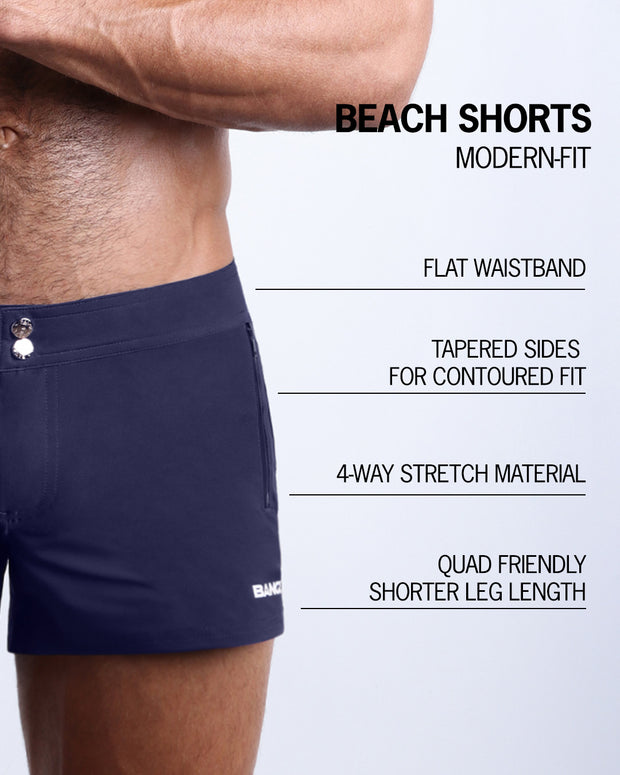 Infographic explaining the many features of these modern fit DAPPER BLUE Beach Shorts by BANG! Clothes. These swimming shorts have a flat waistband, tapered sides for a contoured fit, 4-way stretch material, and quad-friendly leg length. 