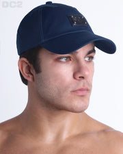 Side view of the Chillax Cap in NAVY BLUE,  a dark blue color, features ventilation eyelets on the cap to provide extra breathability, perfect for active wear.
