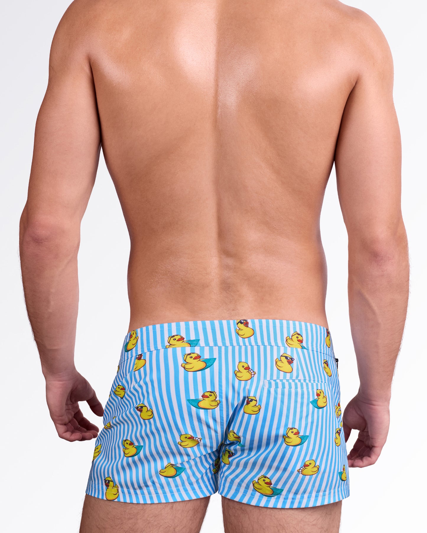 BANG Ducks Just Wanna Have Fun Beach Shorts — close front view highlighting the fun duck print, structured waistband with double snap-button closure, and modern resort-ready design.
