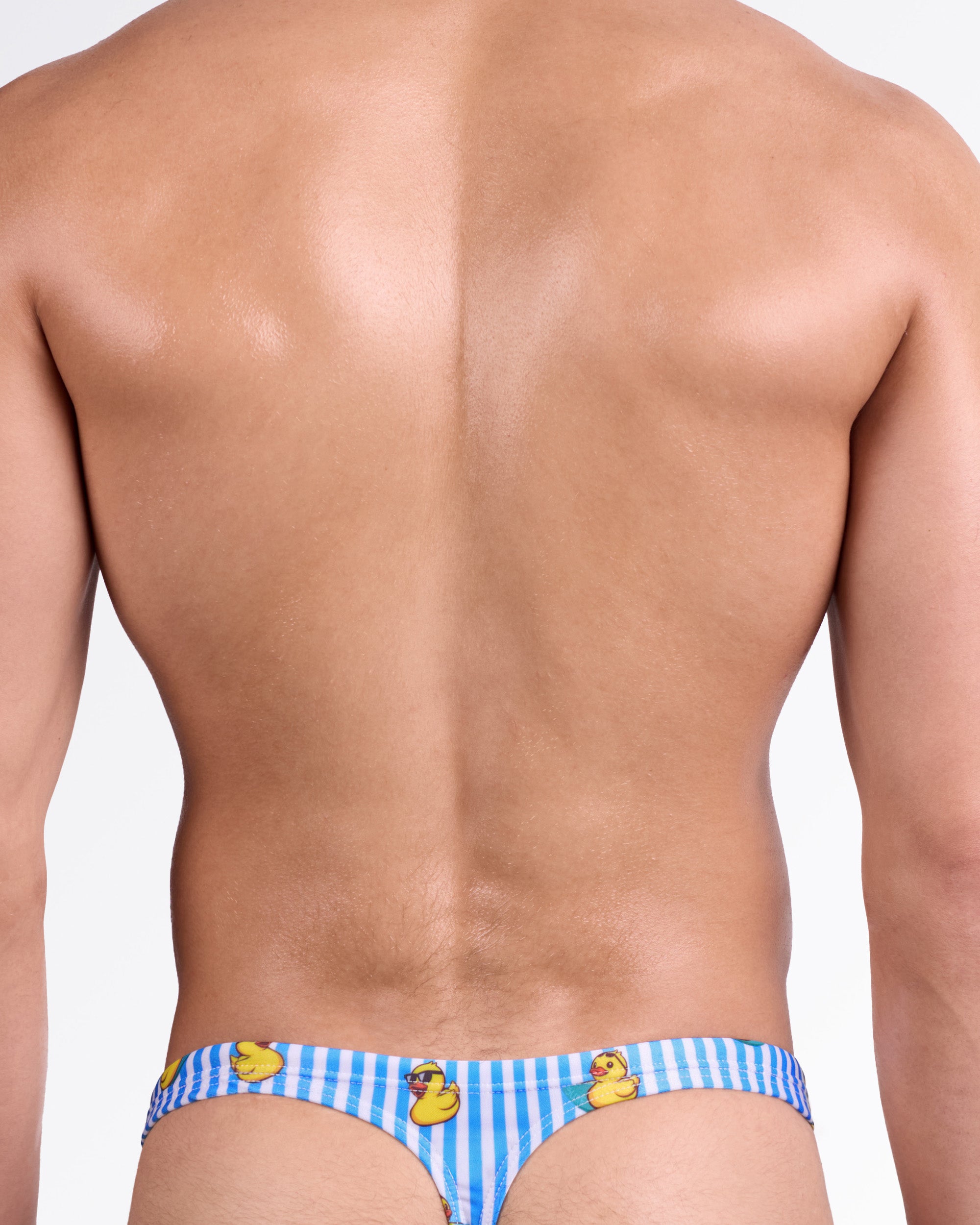 BANG Ducks Just Wanna Have Fun Swim Thong — back view highlighting minimal thong cut, slim waistband, and whimsical duck pattern over classic striped base.