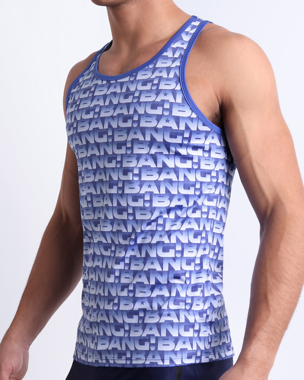 Side view of the ESCAPADE (BLUE/WHITE) for men’s summer Tank Top. Features a monogram print in blue and white colors. The tank top is blue in color with white BANG! logo, this top is designed by BANG! Clothes in Miami.
