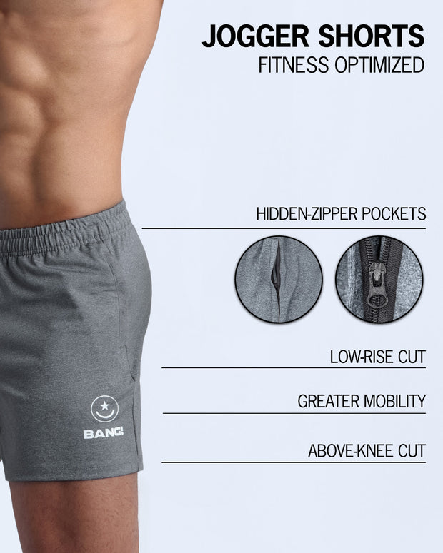 The BANG! FIRM GREY Jogger Shorts - designed with sweat-wicking fabric to keep you cool and dry, hidden zipper pockets to keep your essentials safe, a low-rise cut for a comfortable fit, and an above-knee length for maximum mobility. 