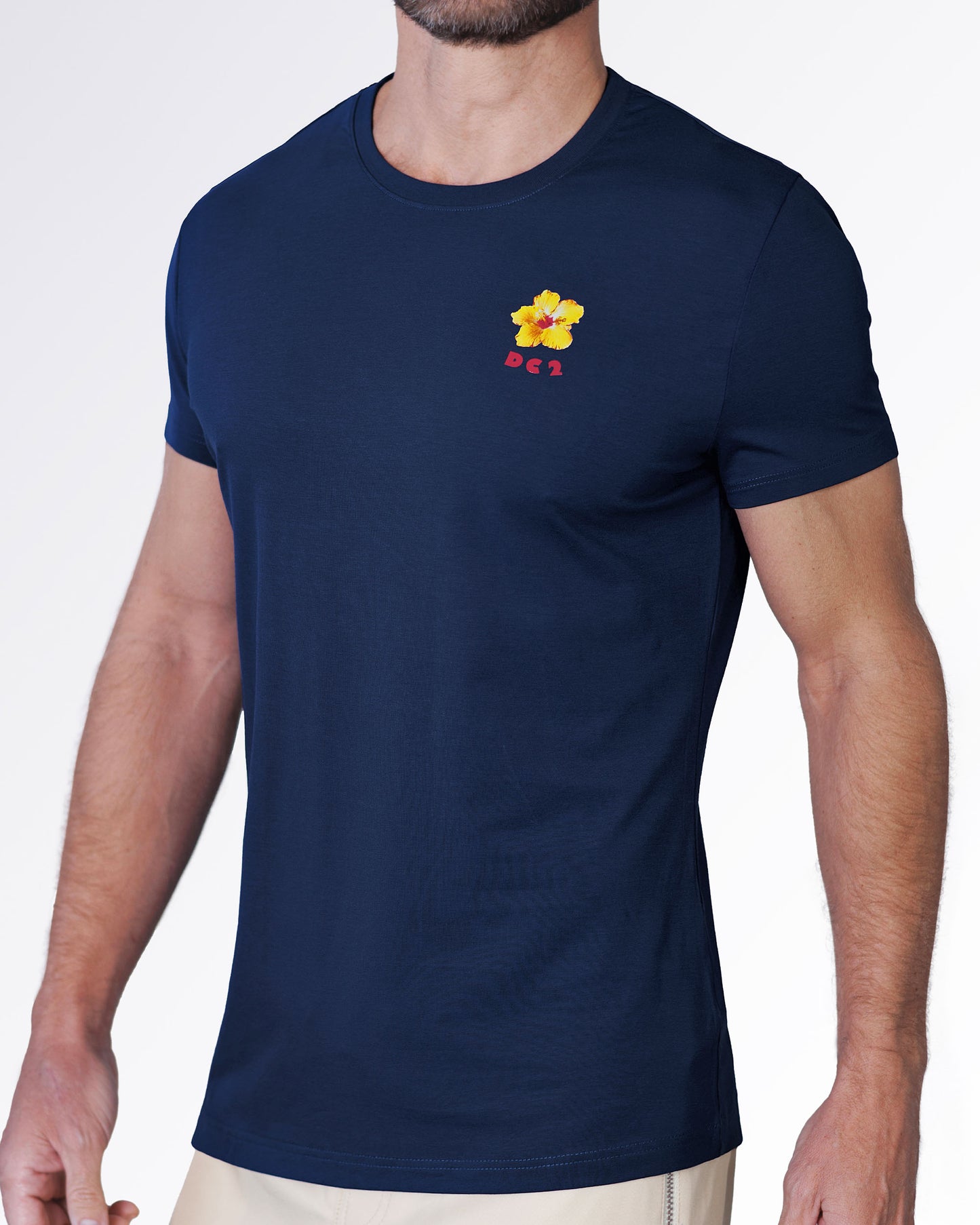 Angled view of the Flower Powers (Blue) Graphic T-Shirt featuring a navy crewneck silhouette with vibrant floral chest artwork and a modern tailored fit.