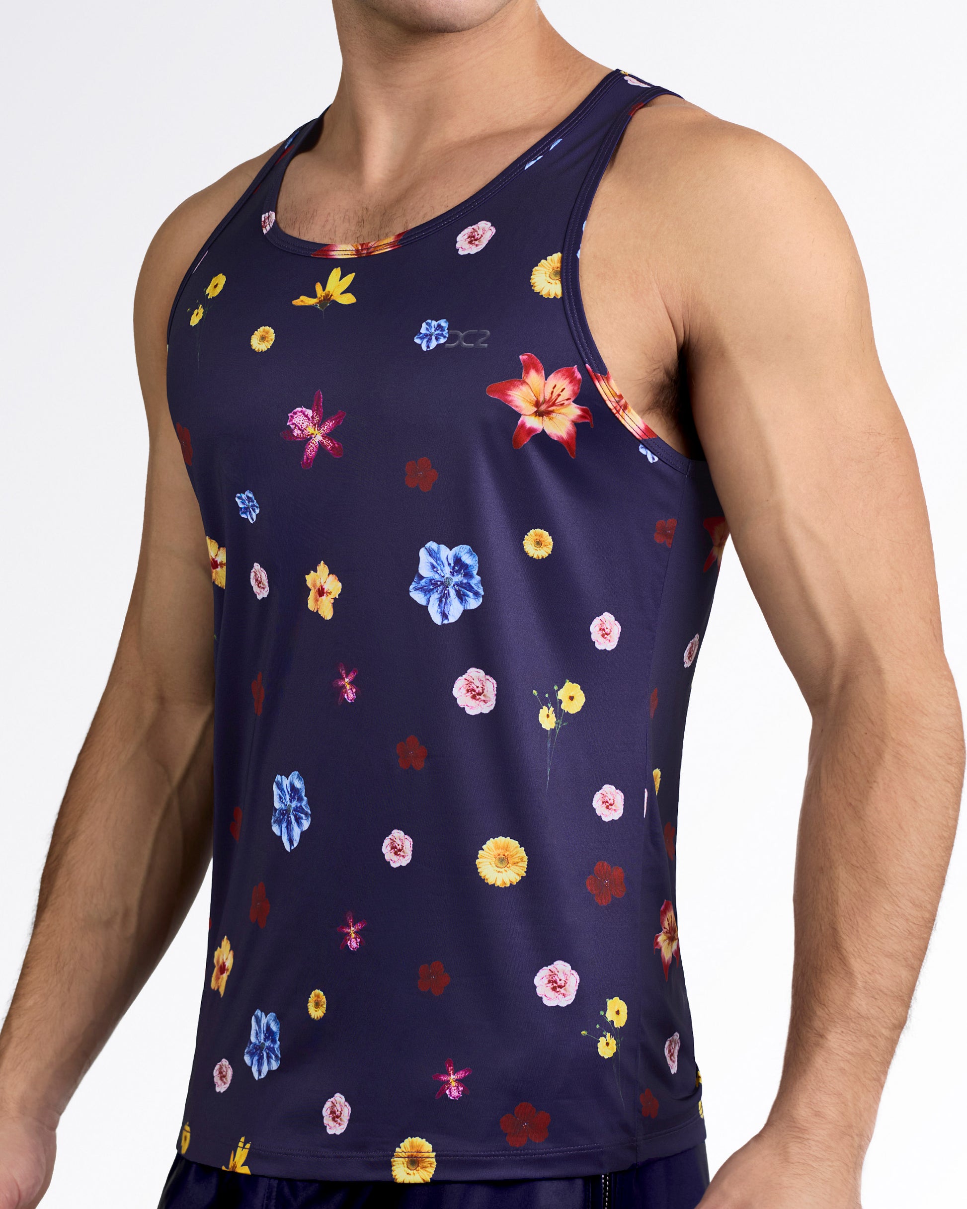 DC2 Flower Powers (Blue) Gym Tank Top — angled side view showing tailored fit, wide shoulder straps, and breathable activewear construction.