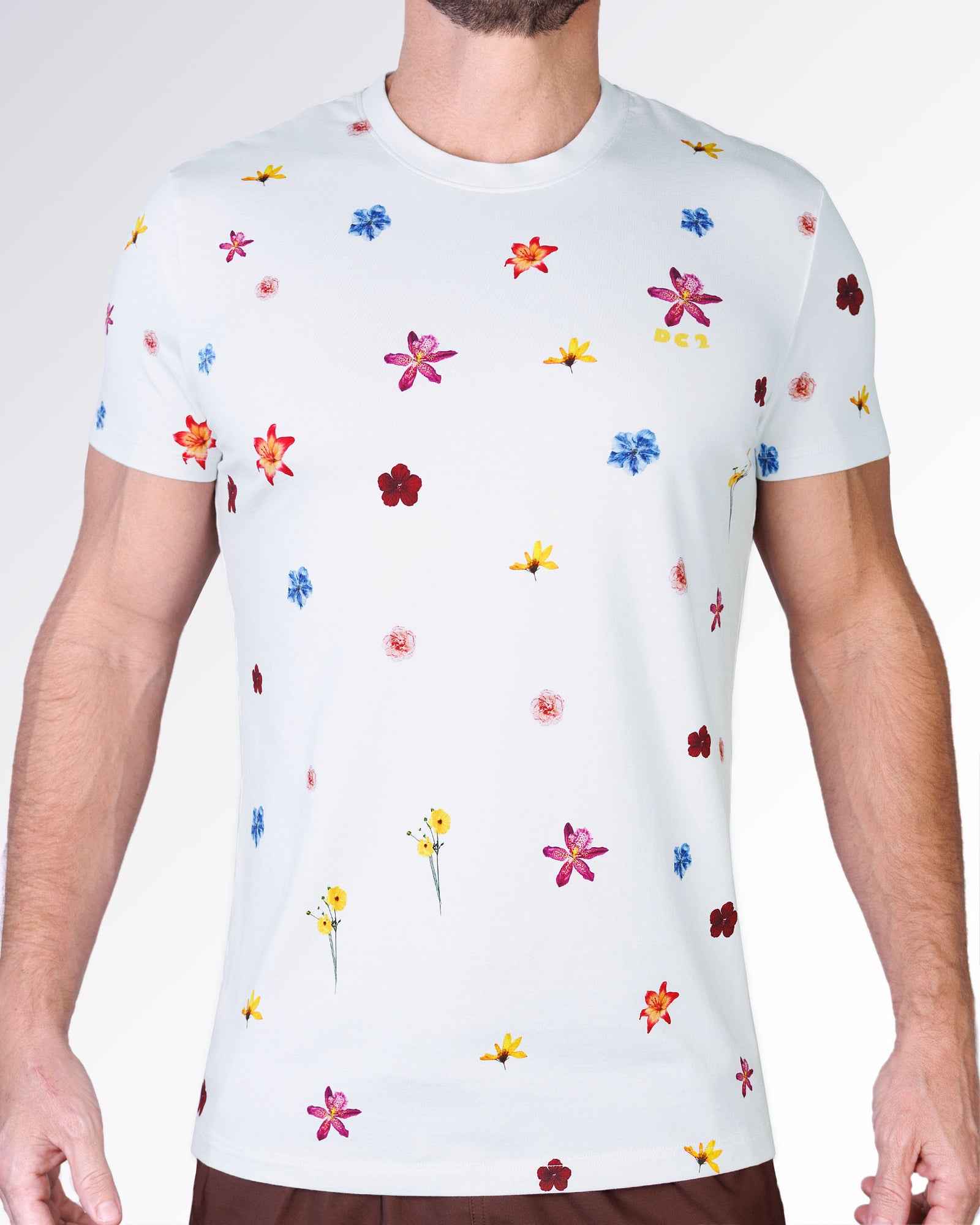 Flower Powers Cream Graphic T-Shirt by DC2 Miami featuring a cream base with scattered multicolor floral illustrations and a lightweight summer look.
