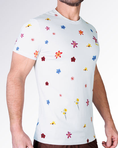 Flower Powers Cream Graphic T-Shirt by DC2 Miami shown from the side, highlighting the all-over floral print with colorful blooms on a cream background.