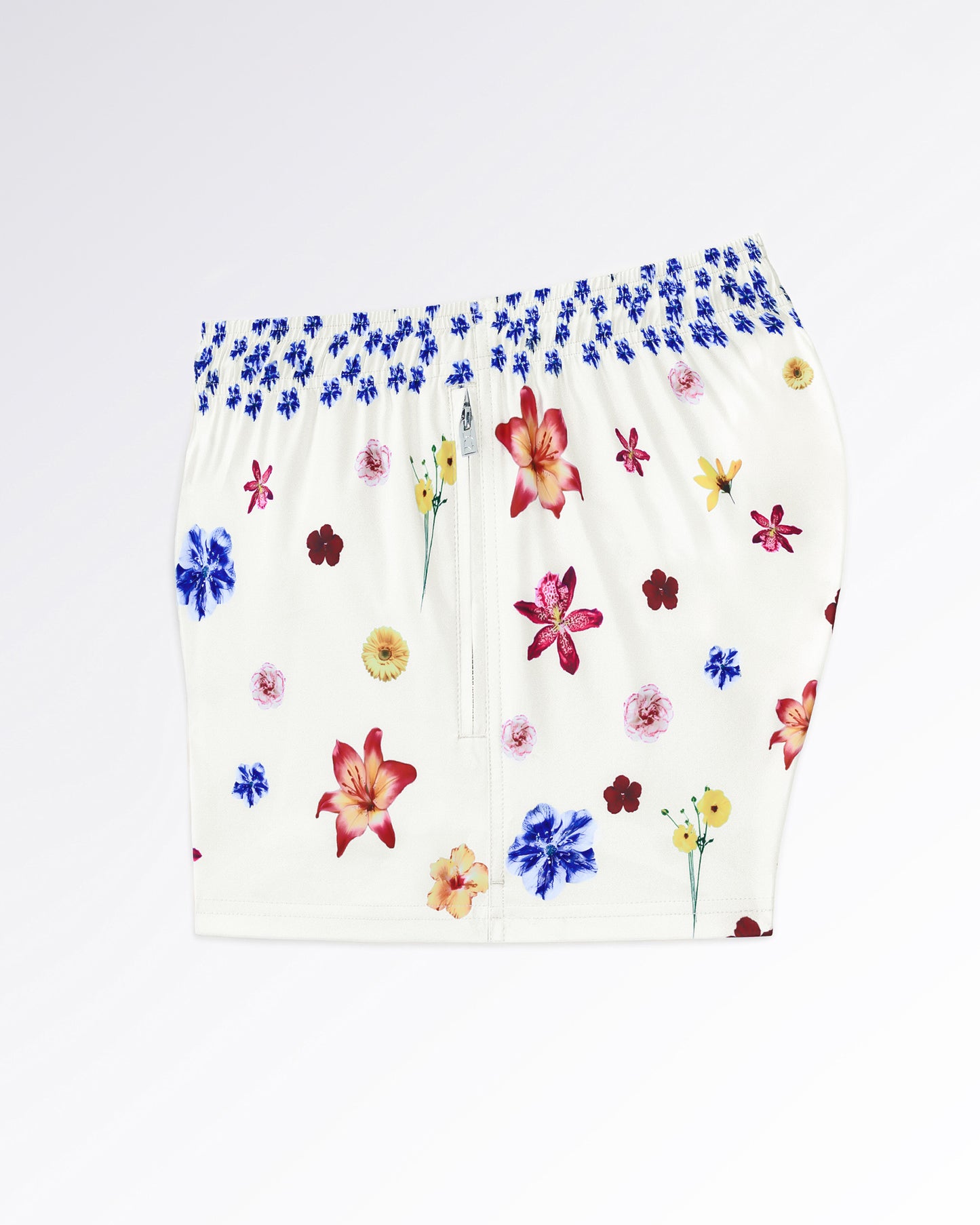 DC2 Flower Powers (Cream) Poolside Shorts — angled flat-lay view emphasizing the lightweight fabric and vibrant flower print distribution.