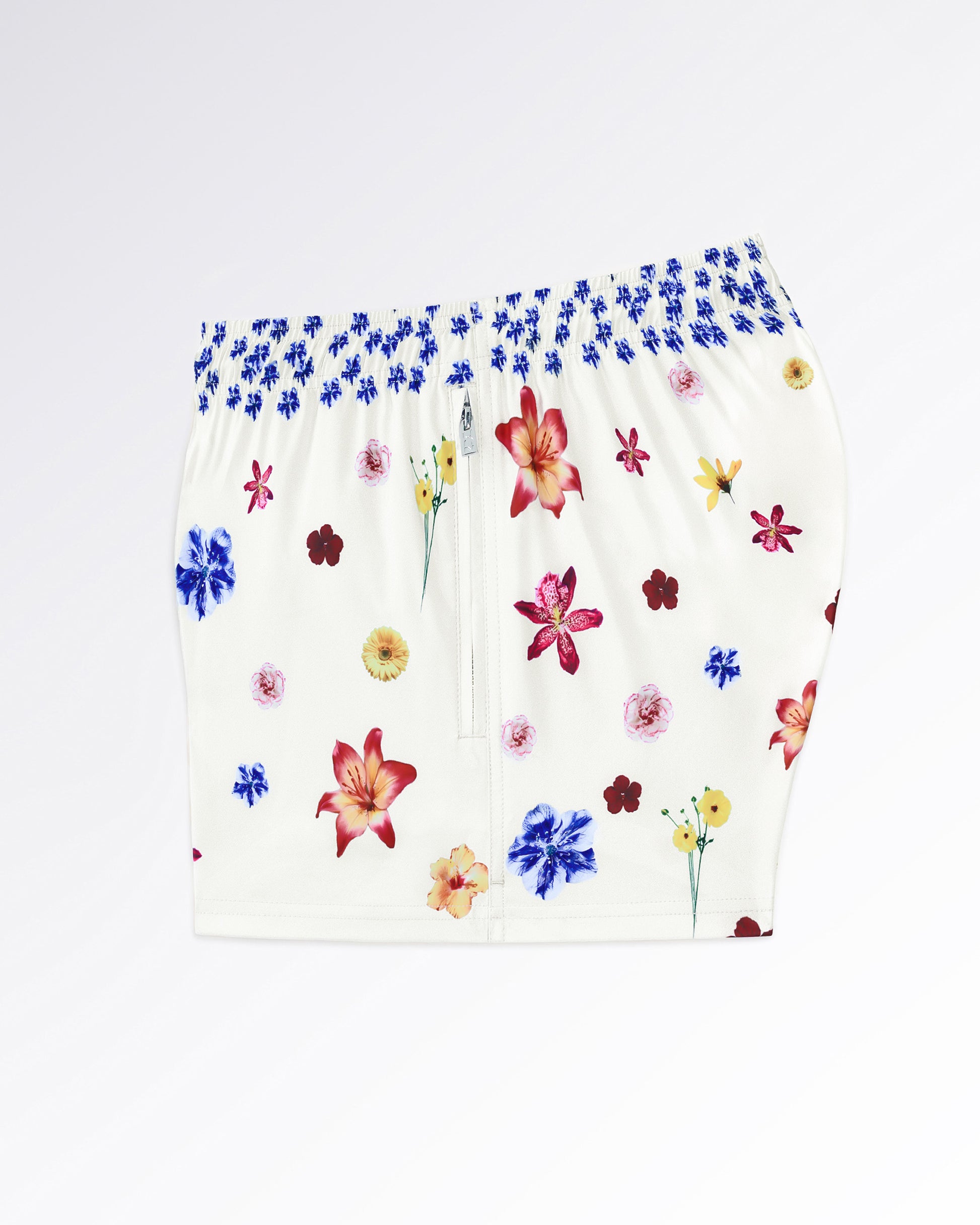 DC2 Flower Powers (Cream) Poolside Shorts — angled flat-lay view emphasizing the lightweight fabric and vibrant flower print distribution.