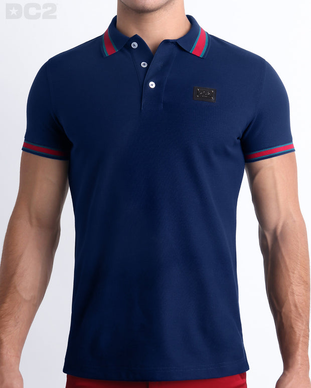 Front view of the FONTAINE BLUE Polo Shirt. It features a slim fit and short sleeves for a modern twist. Made from Peru&