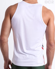 Male model wearing men’s FORZA WHITE men’s Summer Tank Top in white color with stylish green and red colored stripes. This high-quality shirt is by DC2, a men’s beachwear brand from Miami.