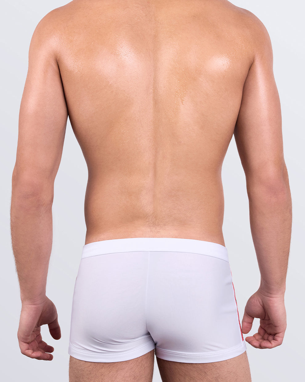 DC2 FORZA WHITE Swim Trunks — back view highlighting skin-hugging fit and seamless rear design.