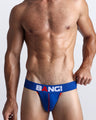 Front view of a sexy male model wearing a BANG! Cotton Jockstrap in FANTASY a solid blue color with a blue waist-band with the BANG! Logo offering a perfect fit. 