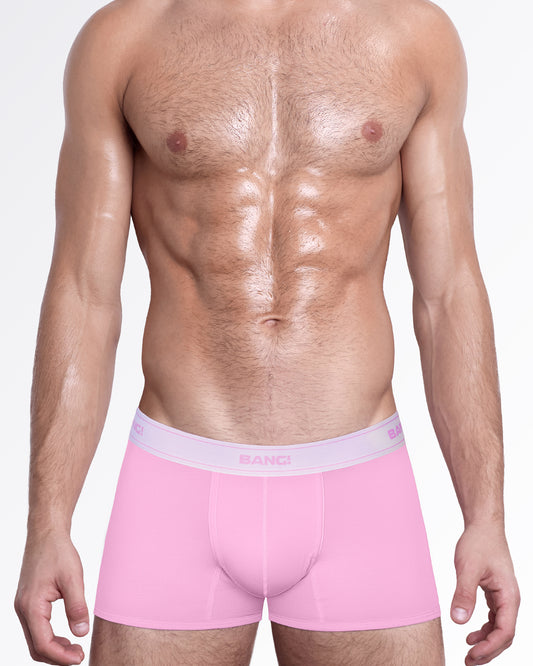 Model wearing Gently Pink Skin Soft boxer briefs for men, with a contour pouch, soft modal cotton fabric and tonal BANG! waistband.