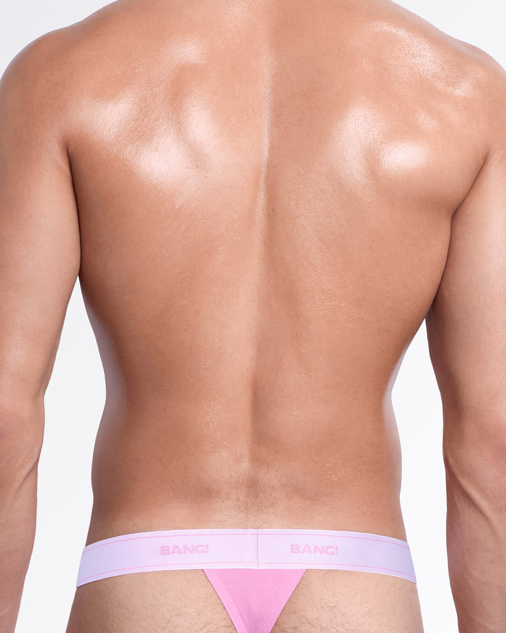 Back view of the Gently Pink men's cotton modal thong, showcasing the sleek T-back design, ultra-soft stretch fabric, and signature BANG! elastic waistband.