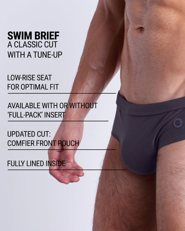 Infographic explaining the classic cut with a tune-up GOTHAM GREY Swim Brief by DC2. These men swimsuit is low-rise seat for optimal fit, available with or without &