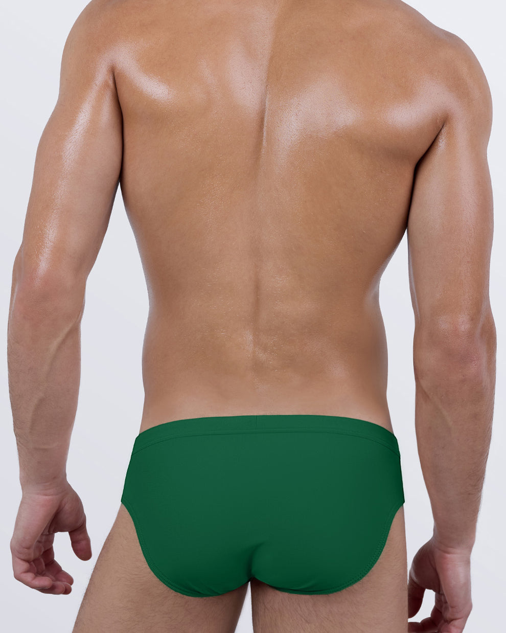 DC2 GREEN RUSH swim briefs — back view showing the seamless fit and contoured seat in a vivid green hue.