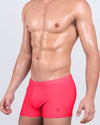 DC2 HIGH VOLTAGE RED Swim Trunks — side view highlighting square-cut silhouette, quick-dry fabric, and bold red color.