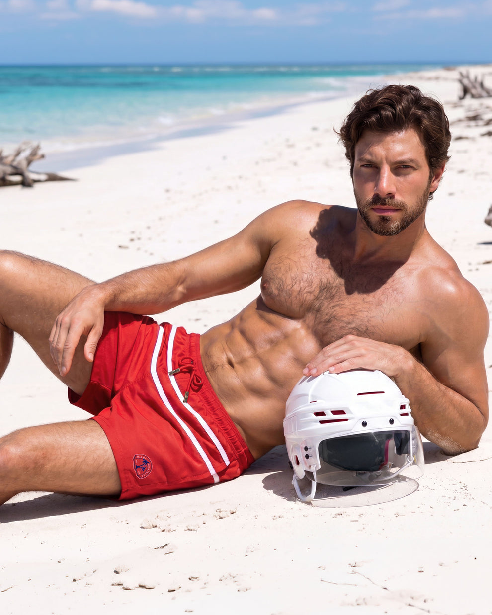 BANG Miami Heated Rivalry The Scott Show Shorts — model wearing red athletic shorts inspired by classic hockey uniforms, featuring contrast side stripes and a sporty summer silhouette.