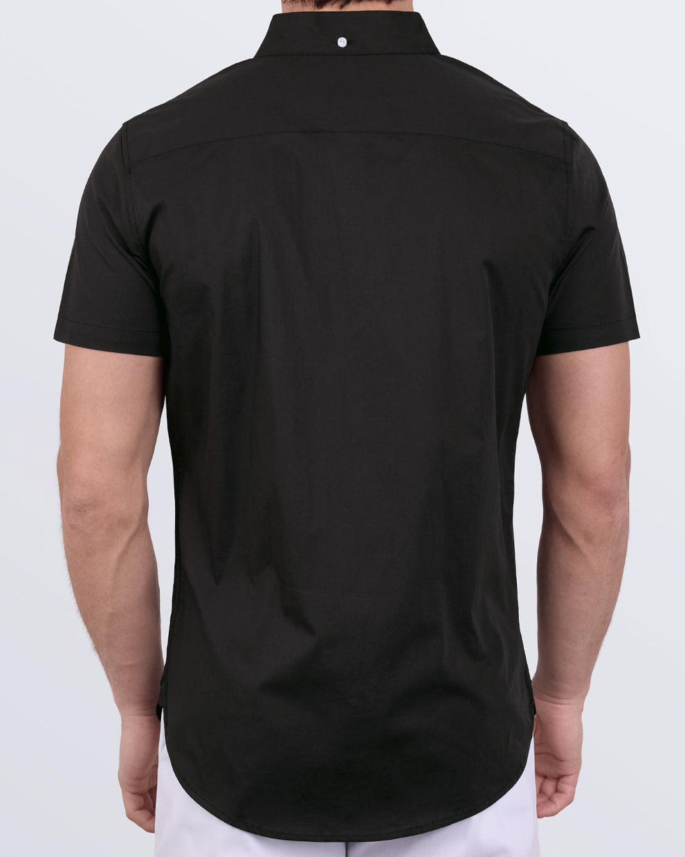 Back view of Jet Black men’s cotton shirt showing curved hem and modern slim fit design.