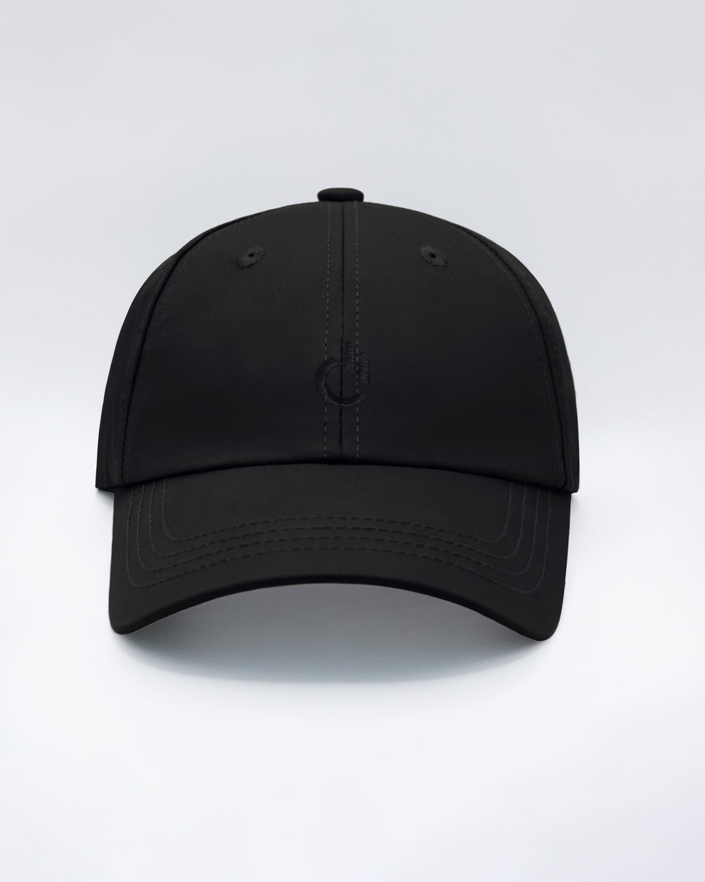 DC2 Resort Cap in White — front view showcasing a clean, minimalist design with embroidered DC2 logo and curved brim.