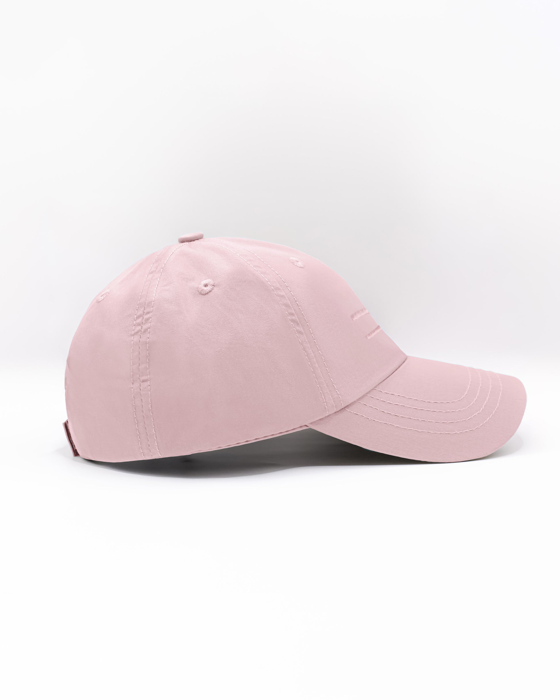 DC2 Resort Cap in Leisure Pink — side view showing the low-profile fit and smooth cotton twill finish.