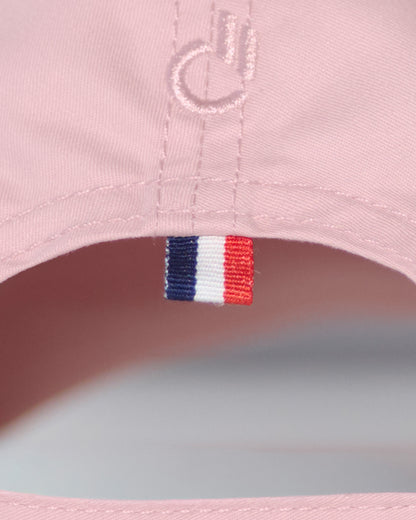 Back detail of the DC2 Resort Cap in Leisure Pink — featuring tonal stitching and a woven tricolor accent tab.