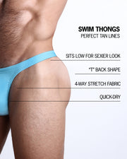 Infographic explaining the many features of the BANG! Clothes MAGNET BLUE Swim Thongs. These Summer speedo fit men's swimsuit is perfect for tanning, they sit low for a sexier look, "T" back shape, have 4-way stretch fabric, and are quick-dry.