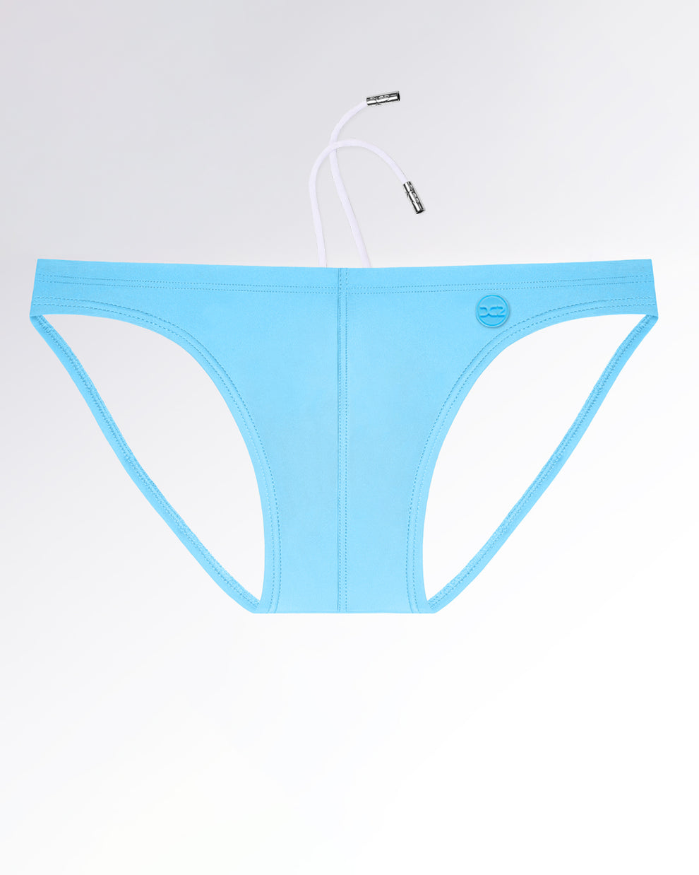 DC2 Magnet Blue — model wearing Swim Mini Briefs, featuring a sleek fit with minimal coverage and bold color.