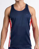 DC2 Maritime Gym Tank Top — model wearing navy men’s tank with red and white vertical side panels and subtle DC2 chest logo.