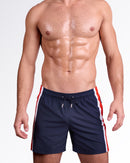 DC2 Miami Maritime Resort Shorts — front view of navy resort shorts with red and white side stripe panels, elastic drawstring waistband, and relaxed fit.
