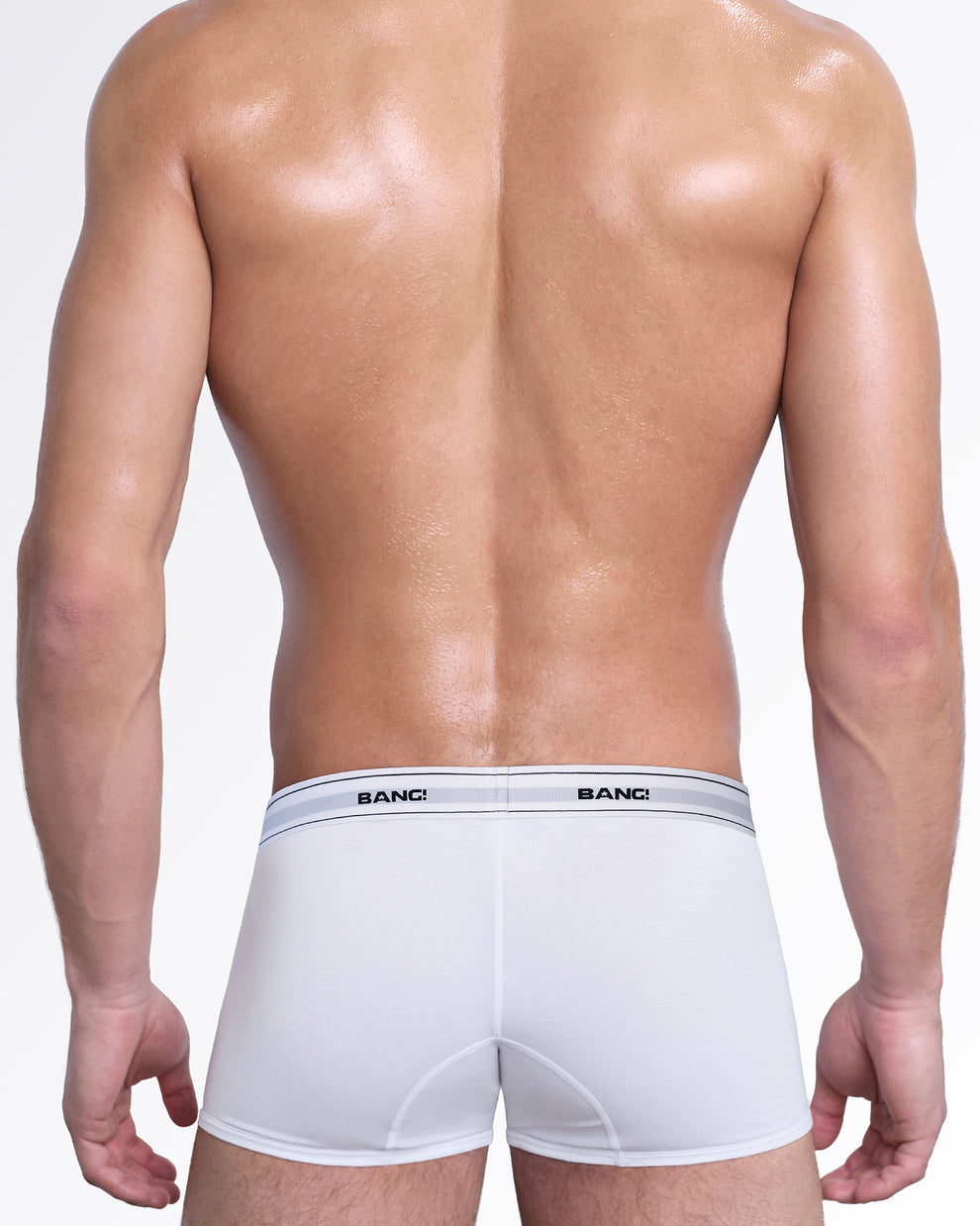 Back view of the Skin Soft Max White boxer briefs by BANG! Miami featuring full-coverage modal cotton fabric, smooth rear fit, and a flexible elastic logo waistband.