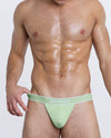 DC2 MISS YOU MUCH Modal Thong — front view in mint green with pouch and bold statement waistband text.