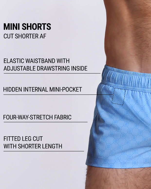 Infographic explaining the many features of the MONO BLUE Mini Shorts. These MINI SHORTS have elastic waistband with adjustable drawstring inside, hidden internal mini-pocket, 4-way stretch fabric, and are quad friendly with shorter leg length. 