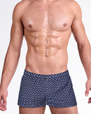 Mono Waves Blue Mini Shorts by DC2 Miami featuring an allover geometric wave-inspired print in navy and white with a tailored swim fit.